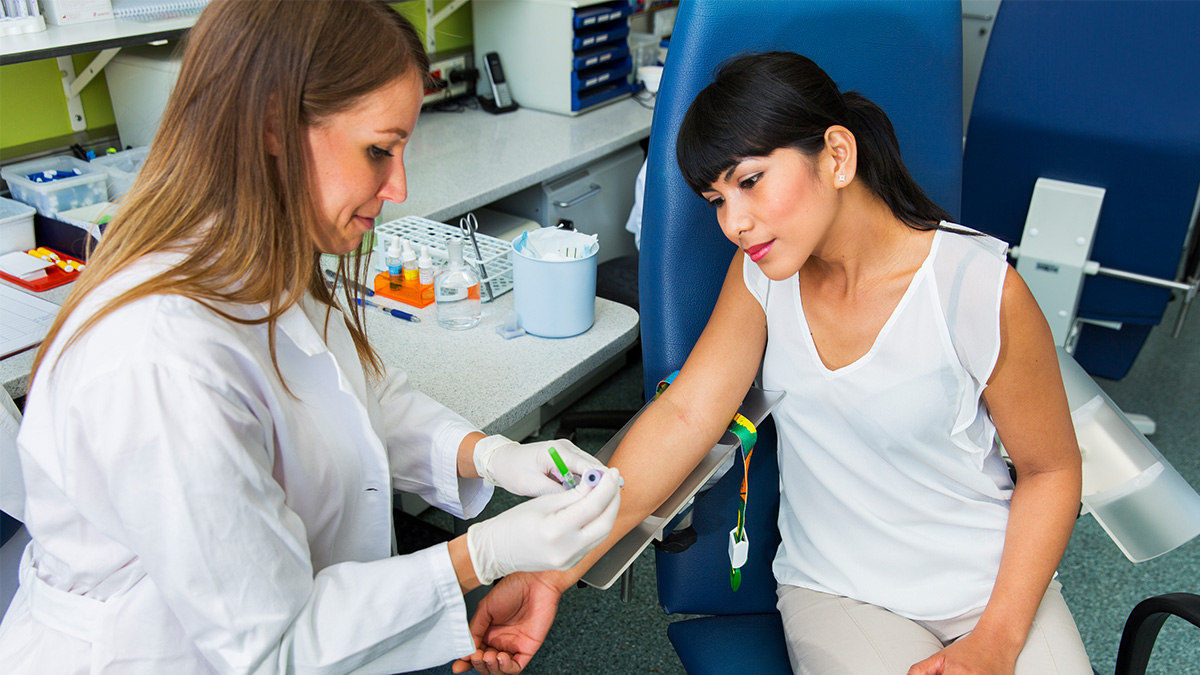 Hepatitis B Testing Thumbnail A doctor collecting a sample from a patient for medical testing