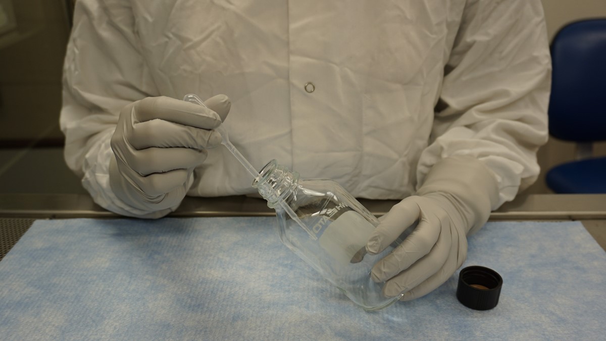 Bottle Bioassay Step Adding insecticide solution to a test bottle for the CDC bottle bioassay.
